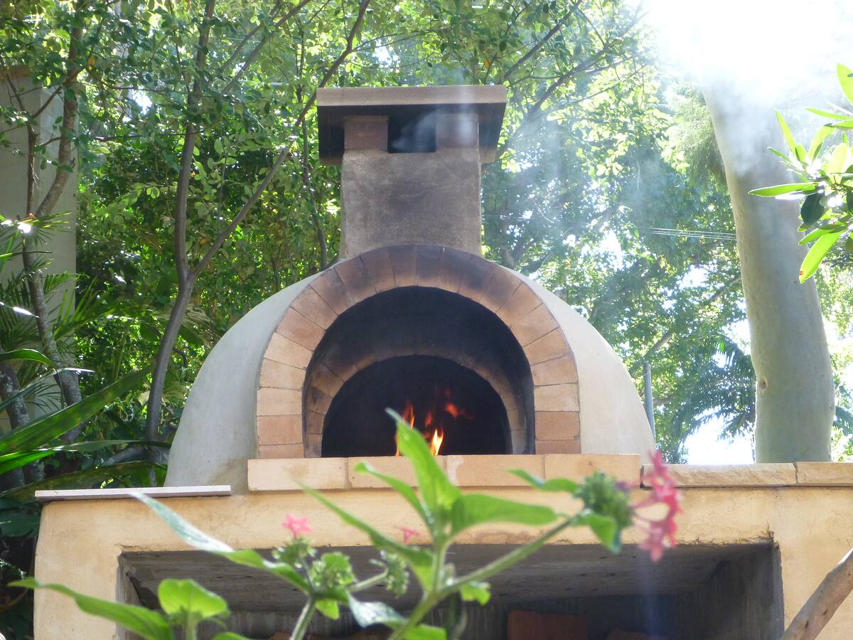 Wood-fired oven set into a leafy Northern Beaches garden