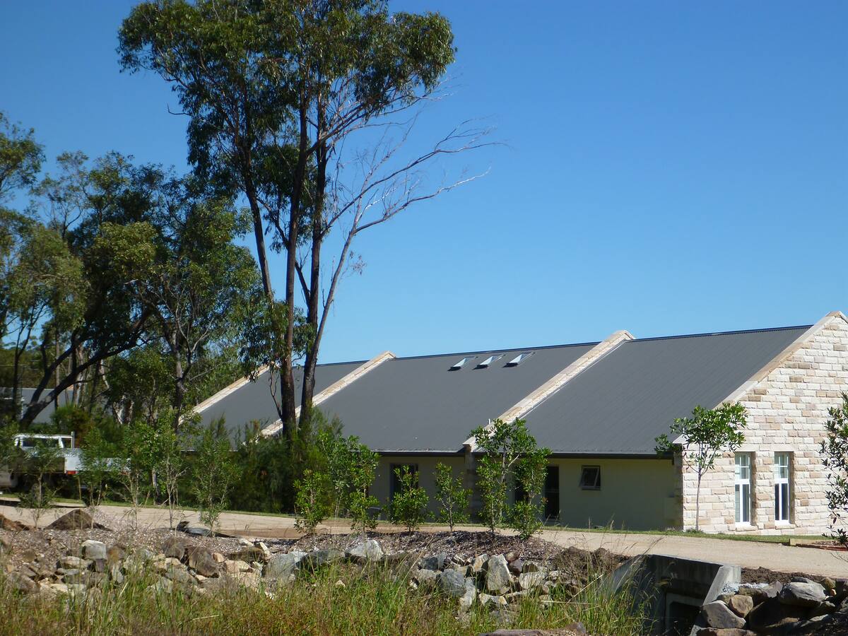 Native garden beds and sandstone home in Duffys Forest