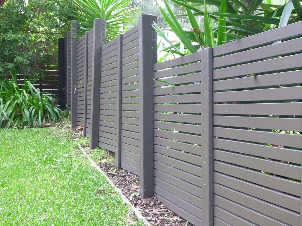 Horizontal slat fence painted charcoal