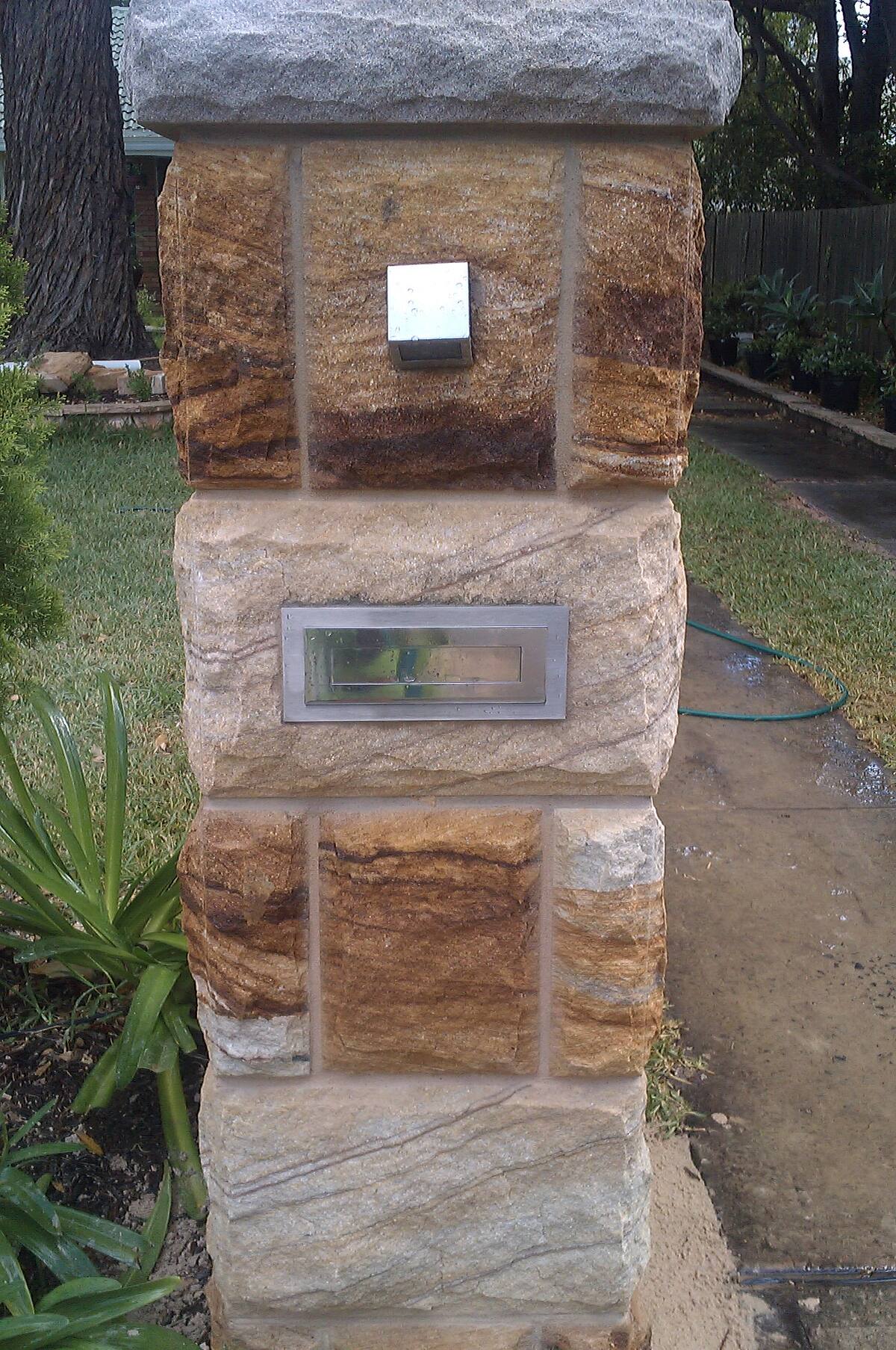 Sandstone letterbox pillar built in Manly