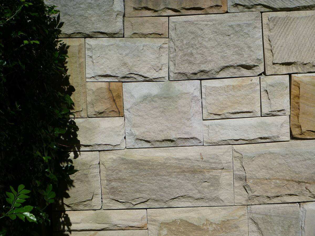 Split-face sandstone garden wall detail